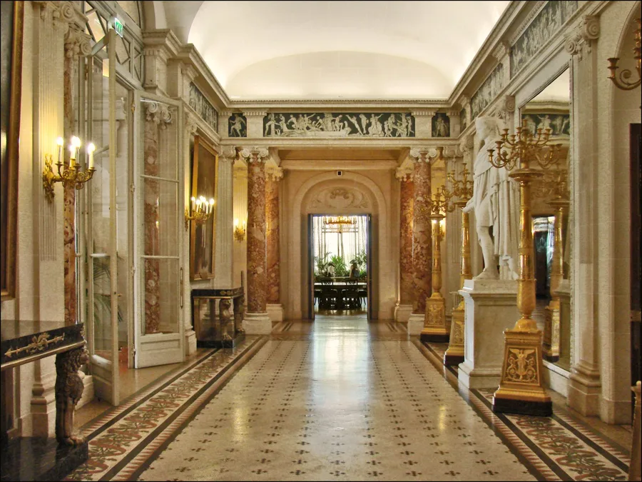 The candle-lit grand gallery of the Villa Masséna, Nice. Architectural reference, not a project of the House.